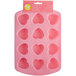 A pink heart shaped silicone candy mold.