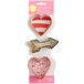 A package of three Wilton metal heart shaped cookie cutters.