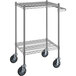 A Regency chrome wire utility cart with two shelves and wheels.