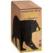 A brown Wandering Bear Bag in Box with a bear design on it containing 3 cases of organic caramel cold brew coffee.