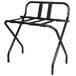 A black metal Lancaster Table & Seating folding luggage rack with a guard.