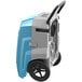 An AlorAir Storm Pro 85 Blue Smart Wi-Fi Enabled Commercial Dehumidifier with wheels.