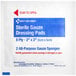 A white package with blue text and a blue and white label for First Aid Only sterile gauze pads.