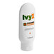 A white bottle of IvyX skin solution with green and orange text.