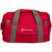 A red First Aid Only bag with grey straps.