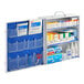 A First Aid Only 3-shelf first aid cabinet with supplies inside.