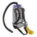 A grey and black ProTeam Super Coach Pro backpack vacuum with a hose attached.