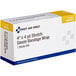 A white and yellow box of First Aid Only sterile stretch gauze with blue and white text.