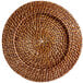 An Acopa round wicker charger plate with a spiral pattern on a white background.
