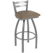 A Holland Bar Stool outdoor counter stool with a brown cushion and stainless steel swivel legs.