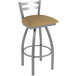 A Holland Bar Stool outdoor counter stool with a Breeze Champagne cushion and stainless steel legs.