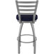 A Holland Bar Stool outdoor counter stool with a blue cushion and stainless steel frame.