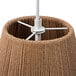 A white pendant light with twine wrapped around the shade.