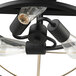 A Globe matte black and brass ceiling light fixture with three bulbs.