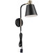 A Globe matte black and antique brass wall lamp with a cord.