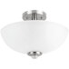 A Globe semi-flush mount ceiling light with a glass shade and metal accents.