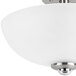 A Globe semi-flush mount light fixture with a white shade.