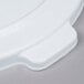 A white plastic Rubbermaid lid with a handle.