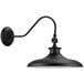A Globe Vintage Black Swivel Arm Wall Sconce with a long curved arm.