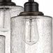 A group of Globe rustic oil-rubbed bronze and seeded glass semi-flush mount lights.