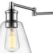 A Globe industrial wall sconce with a clear glass shade over a light bulb.