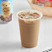 A close-up of a cup of International Delight Mocha Iced Coffee with ice.