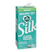 A carton of Silk Organic Unsweetened Soy Milk with text on it.