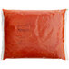 A red plastic bag of Frank's RedHot Original Hot Sauce powder.