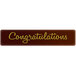 A brown rectangular Chocolatree chocolate decoration with yellow and gold text that says "Congratulations"