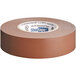 A roll of brown Shurtape electrical tape.