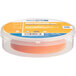 A roll of Shurtape orange electrical tape in a plastic container.
