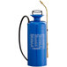 A blue Chapin steel sprayer with a hose.