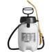 A white Chapin sprayer with a black handle and hose.