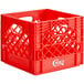 A red plastic Choice milk crate with handles.