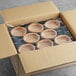 A box with a container of La Rose Noire extra large round vanilla tart shells inside.