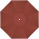 A top view of a red California Umbrella with a white center.