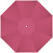A hot pink sunbrella replacement canopy with a white circle in the center.