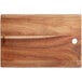 An Acopa Live Edge acacia wood serving board with a hole in the middle.