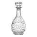 An Acopa clear glass whiskey decanter with a decorative design and a stopper.