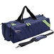 A navy blue duffel bag with green straps.