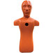 An orange Kemp USA water rescue training manikin with a hole in the middle.