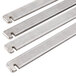 A close-up of three stainless steel metal bars of different lengths.
