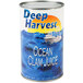 A case of 12 Deep Harvest Ocean Clam Juice bottles.