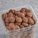 A container filled with Homefree Gluten-Free Mini Double Chocolate Chip Cookies.