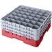 A red and gray plastic Cambro glass rack with several compartments.