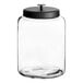 An Acopa Dusk clear glass jar with a black lid.