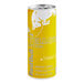 A close up of a yellow Red Bull Tropical energy drink can.