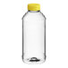 A clear plastic Skep honey bottle with a yellow flip top lid.