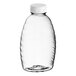 A clear plastic Classic Queenline honey bottle with a white flip top lid.