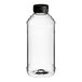 A clear plastic 16 oz. Skep honey bottle with a black cap.